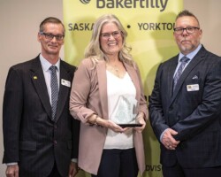 Distinguished Entrepreneur - Laurie Renton:  Laurie Renton accepted the Distinguished Entrepreneur Award, sponsored by YBID, from Doug Hull (L) and Todd Kulscar (R).